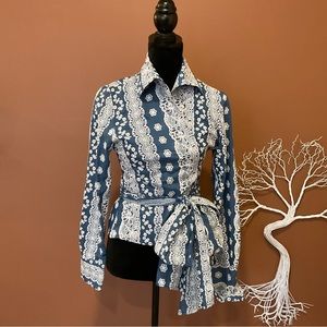 Beautiful Chiquita wrap around blouse.